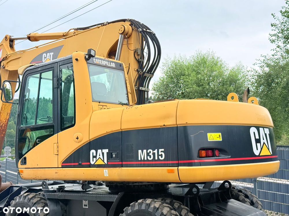 Caterpillar CAT M315C  CATERPILLAR SPROWADZONY  Bardzo Dobry Stan - 9