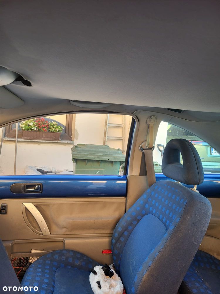 Volkswagen New Beetle - 7