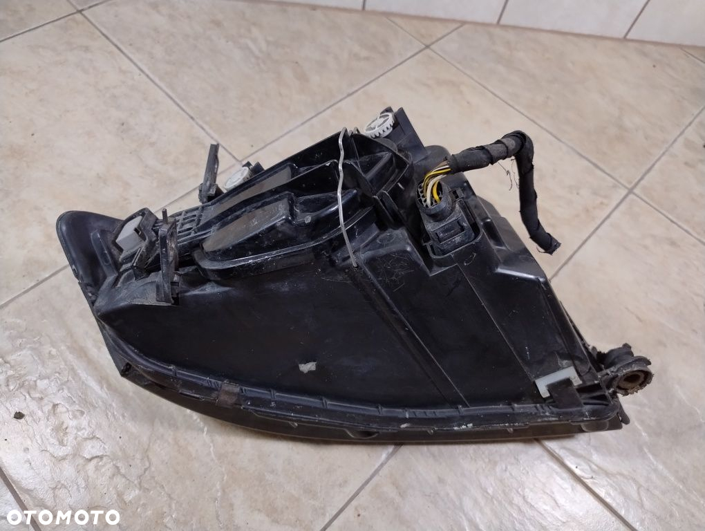 Audi a2 reflektor lampa lewa przód Europa oryginał wysyłka OLX - 8