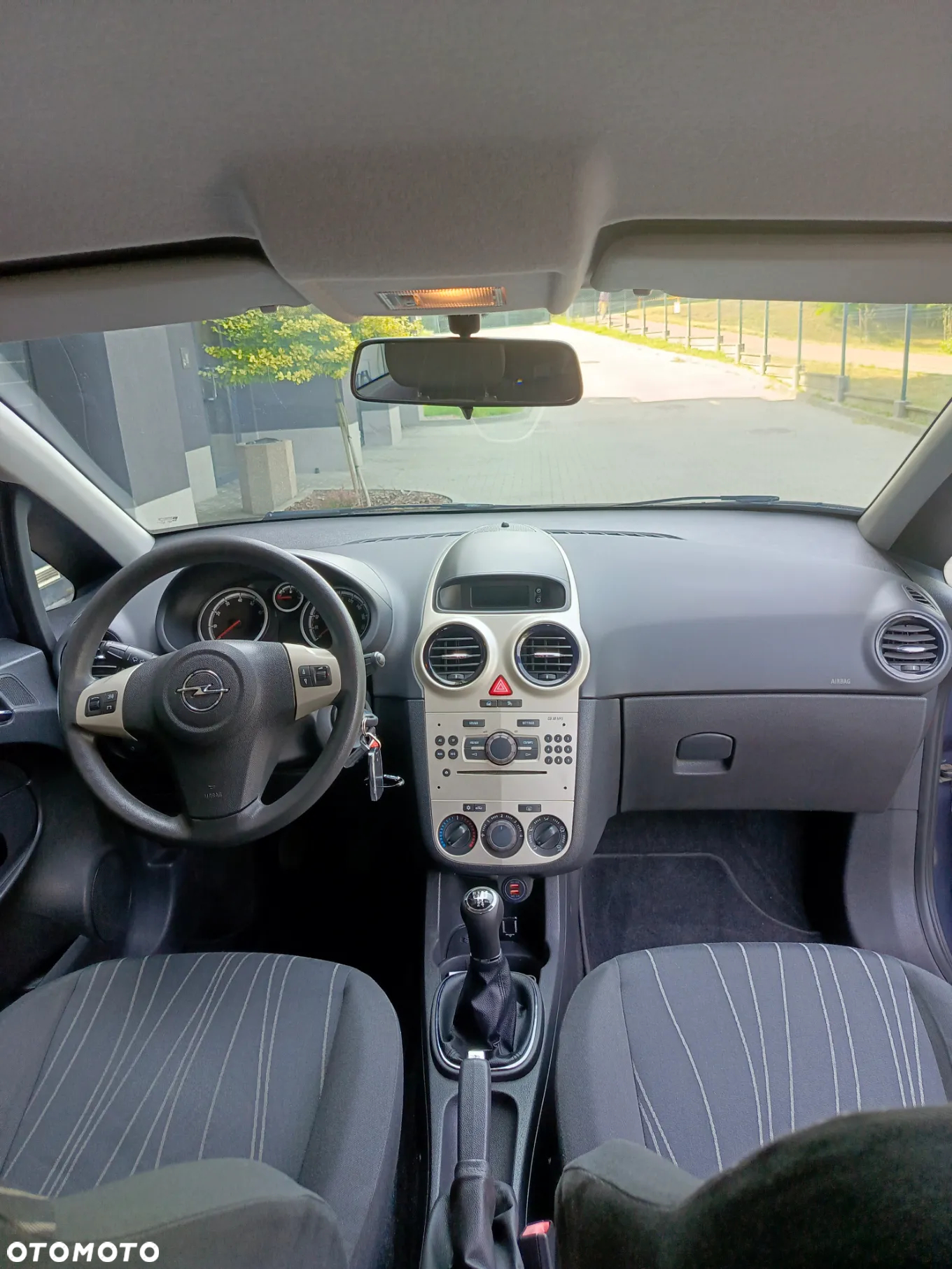 Opel Corsa 1.4 16V Cosmo - 11