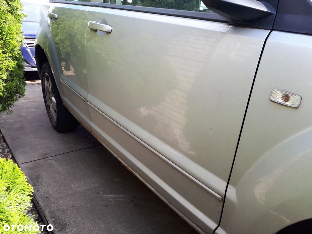 DODGE CALIBER 06-09 2.0 CRD OSŁONA PRZECIWSŁONECZNA PRAWA LEWA DASZEK SŁONECZNIK - 21