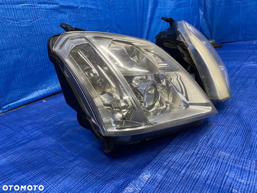 LAMPY LAMPA LEWA PRAWA LEWY PRAWY PRZÓD PRZEDNIA XENON KSEON OPEL MERIVA A LIFT 93321054 93321055 EUROPA ORYGINAŁ - 6