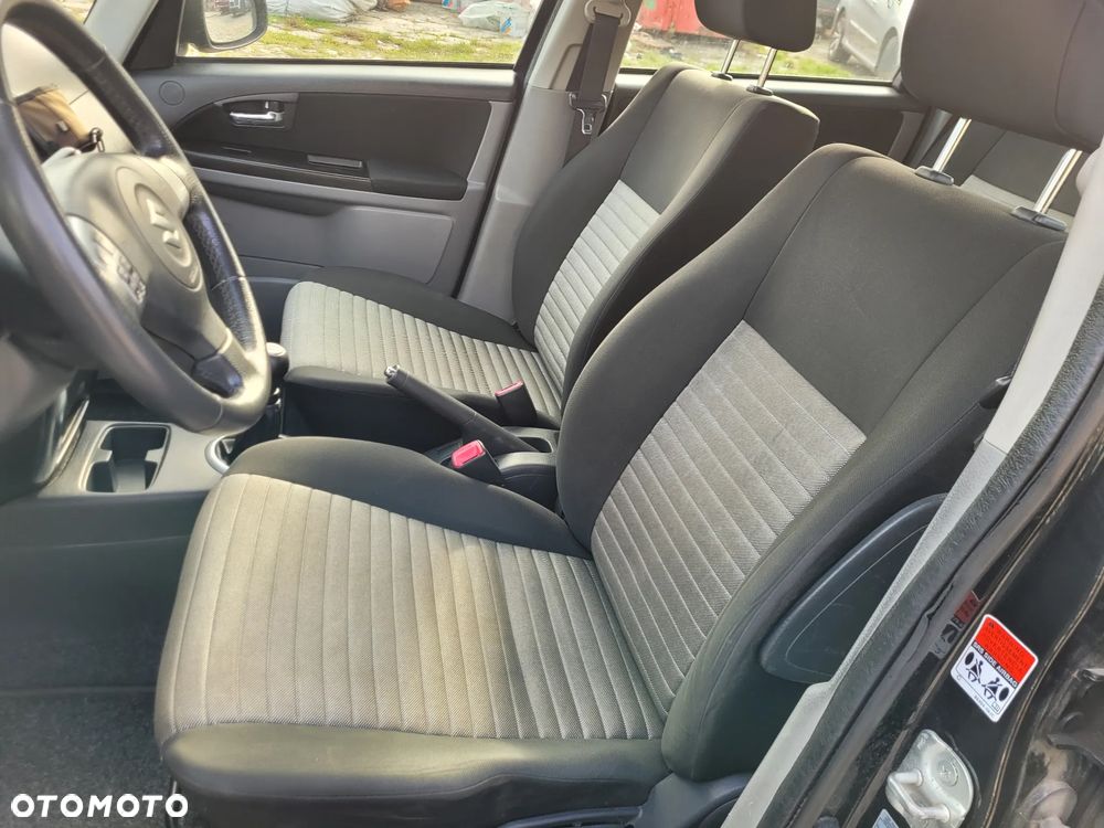 Suzuki SX4 1.6 Comfort Plus - 18