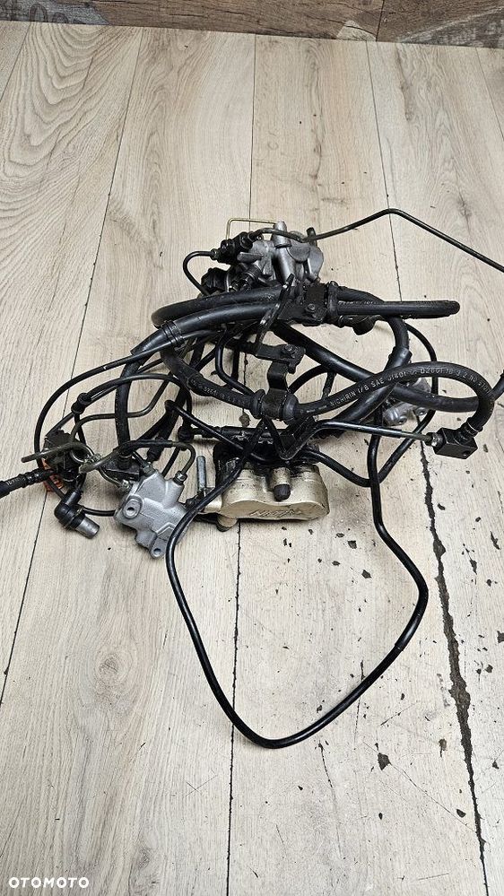 Zacisk hamulcowy Nissin pompa ABS przewód - 16