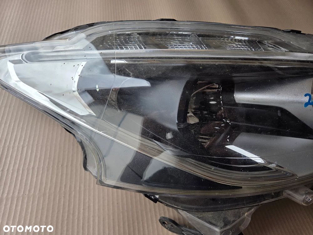 Lampa przednia lewa  Peugeot 208 I LIFT - 4
