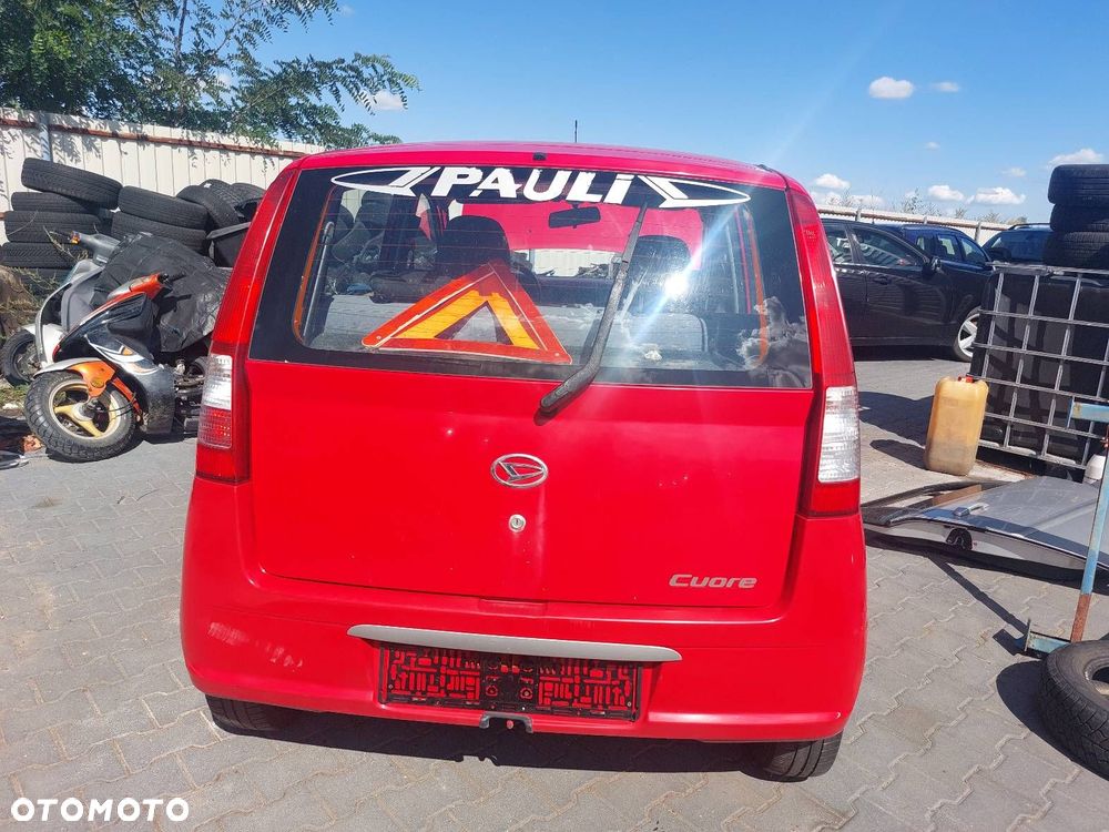 KOMPLETNY TYŁ DAIHATSU CUORE VI 03-07r R29 - 1