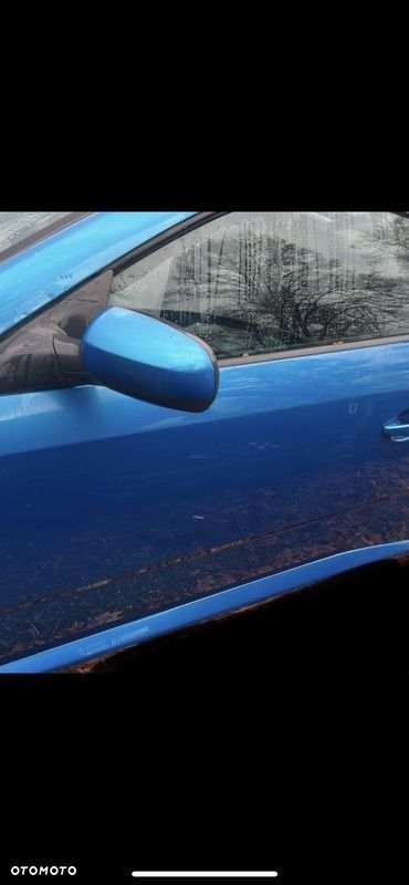 drzwi lewe prawe opel tigra 2004 r.