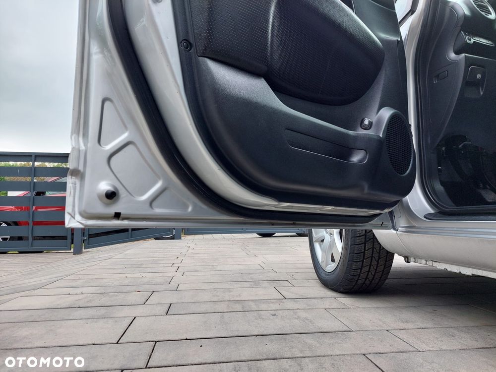 Kia Carens 2.0 CVVT EX - 24