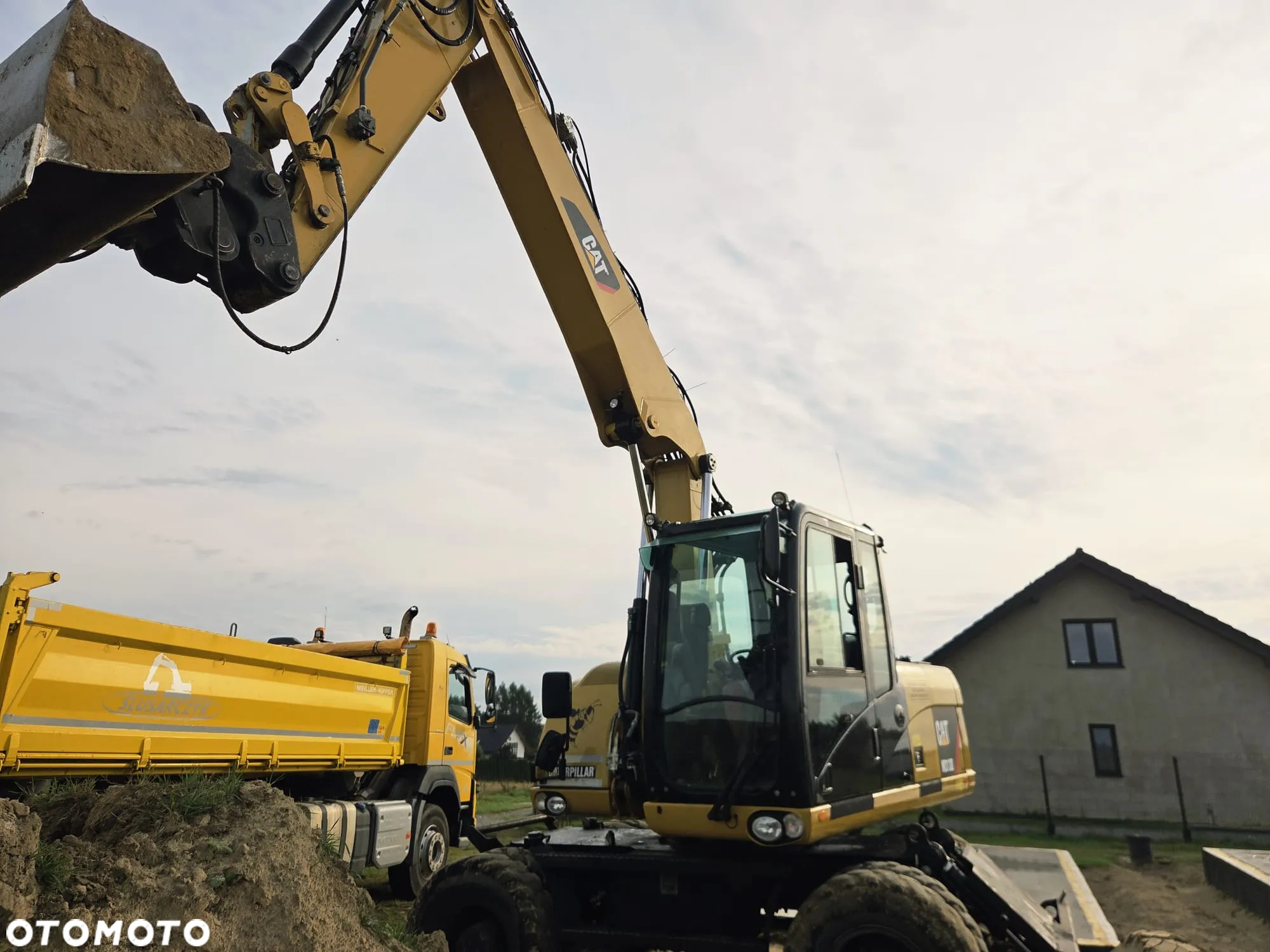 Caterpillar M313D - 12