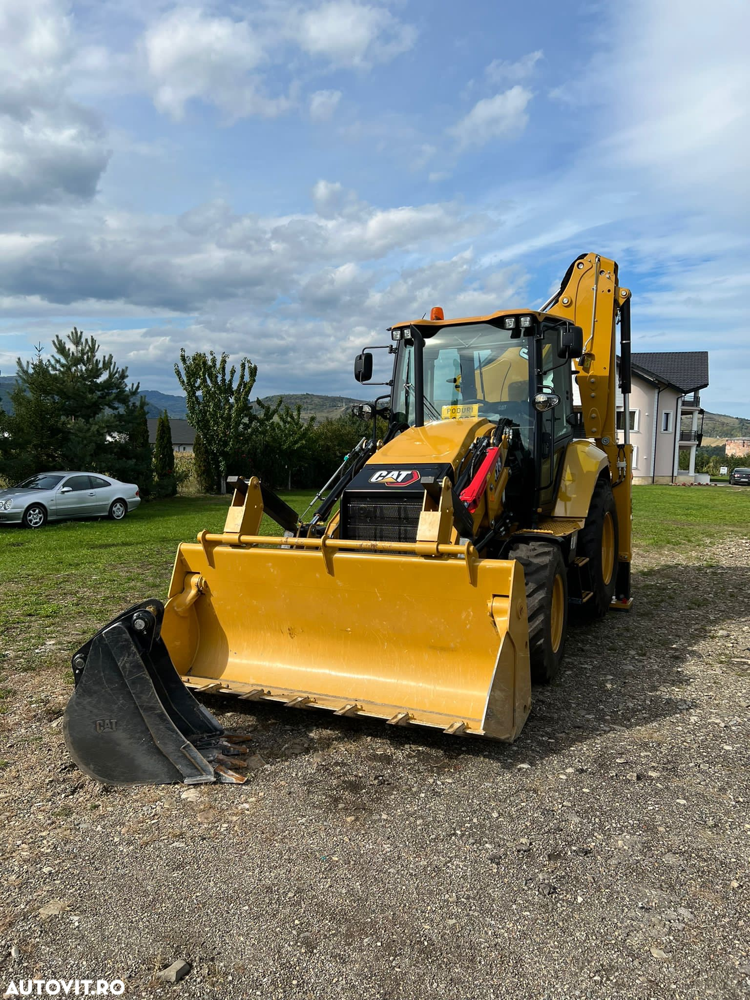 Caterpillar 428 - 6