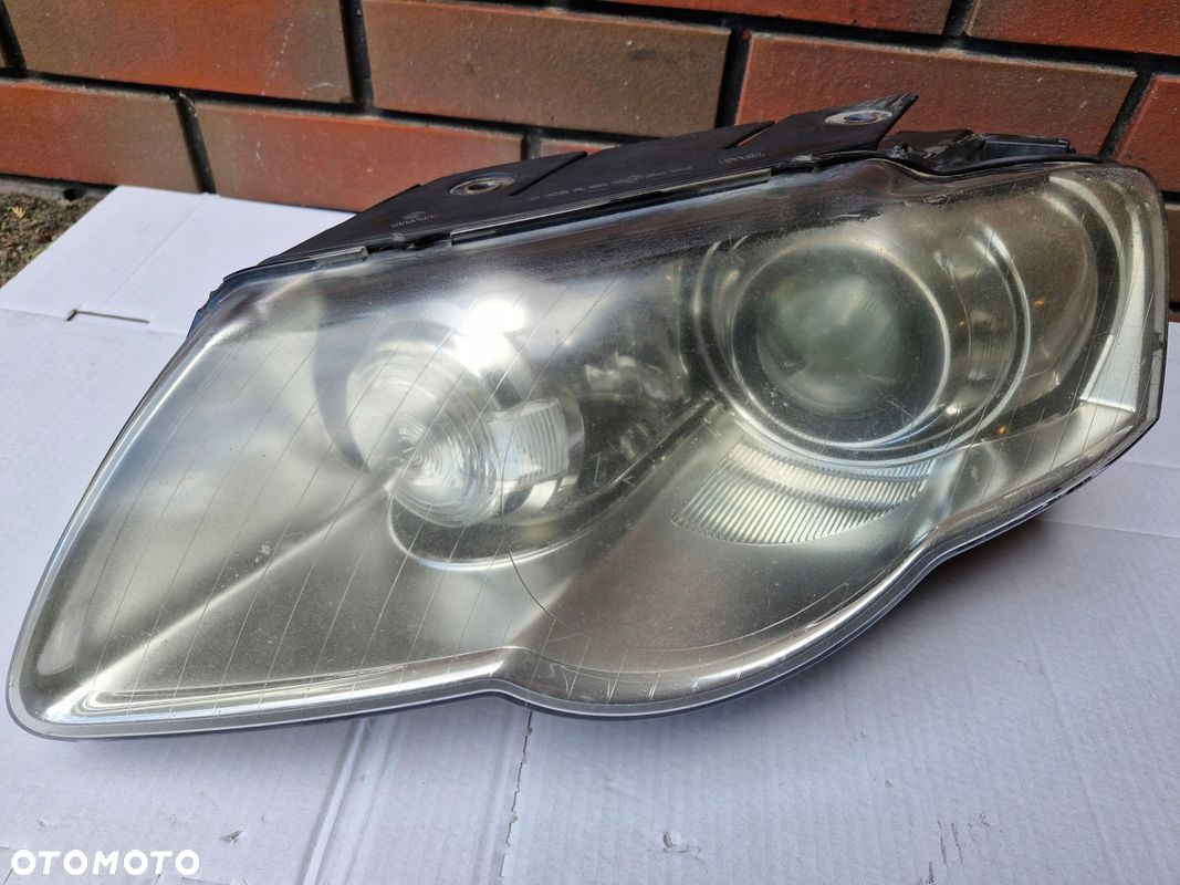 Lampa przód lewa Bi-XENON skrętny kompletna EUROPA do Vw Passat B6 05-10r - 1