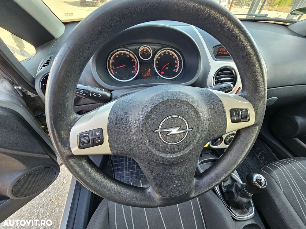 Opel Corsa 1.2i Cosmo - 8