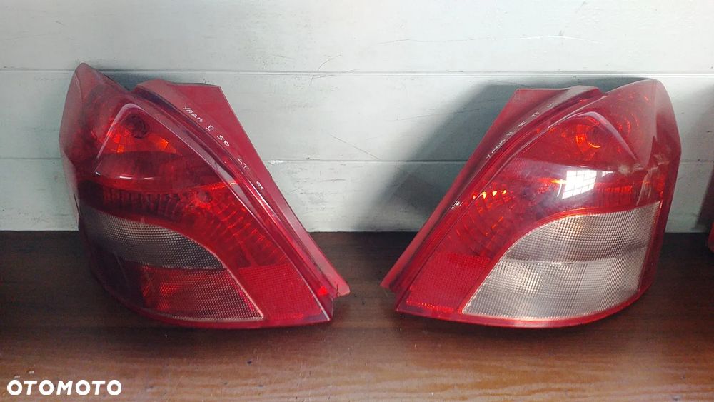 Lampa lewy prawy przód tył Toyota Yaris II 5D - 10