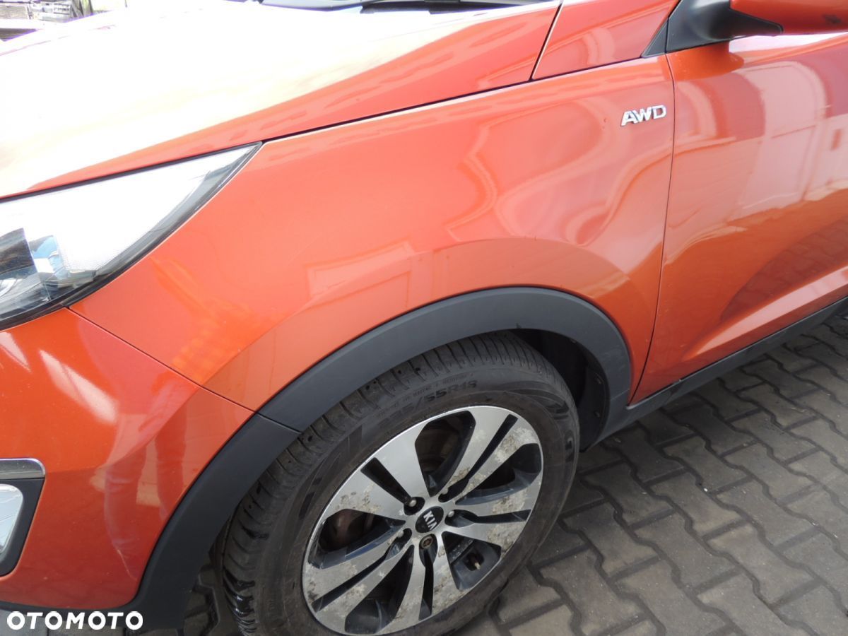 Błotnik lewy KIA Sportage 3 '12 DM - 1