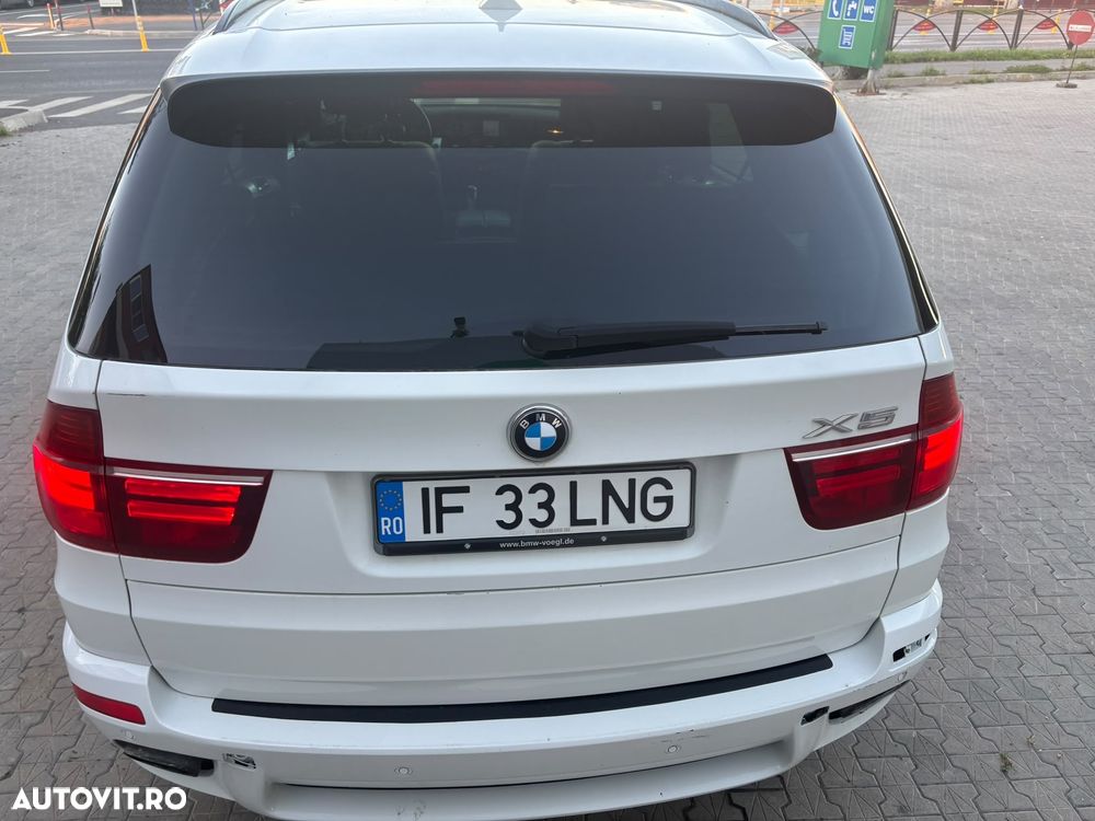 BMW X5 2011 — imagine 9