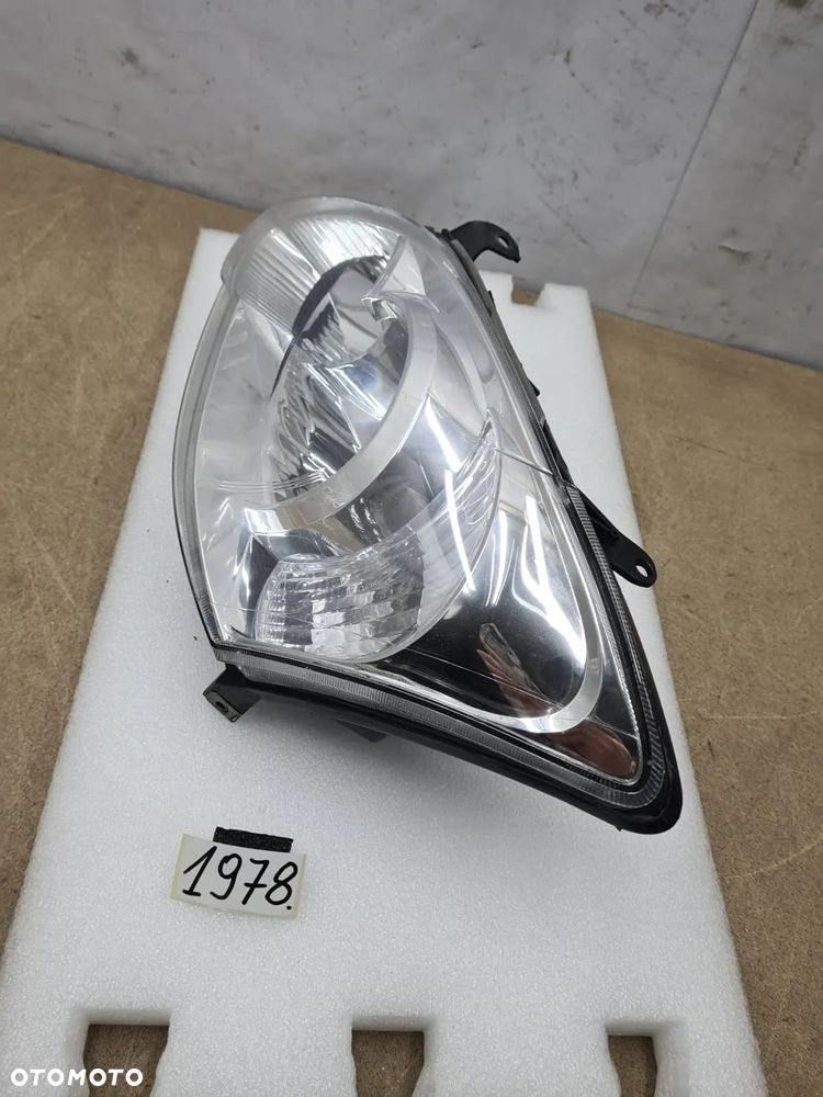 Toyota Corolla E12 04-07r 8117002380 reflektor lampa przednia przód Valeo - 9