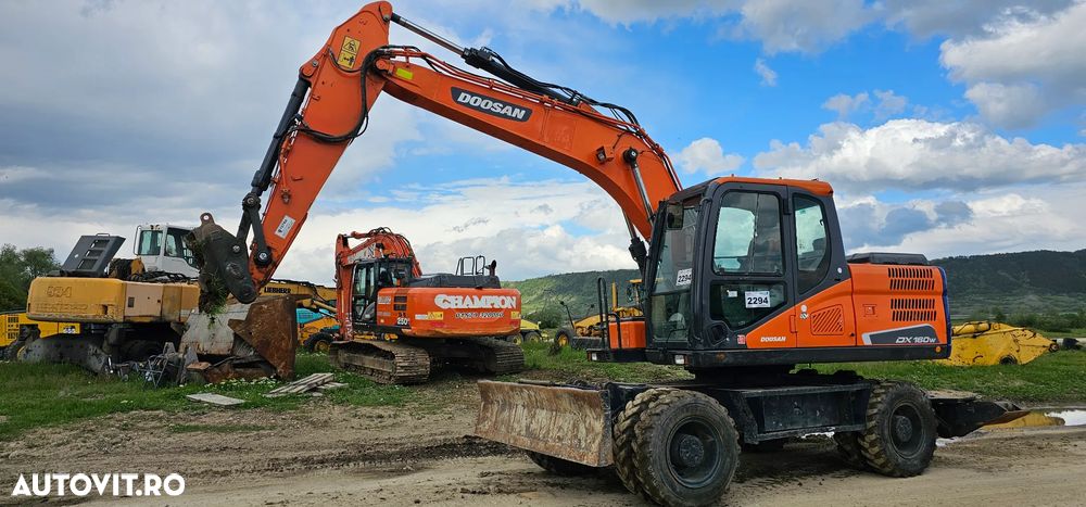 Doosan DX 160 W Excavator pe roți - 18
