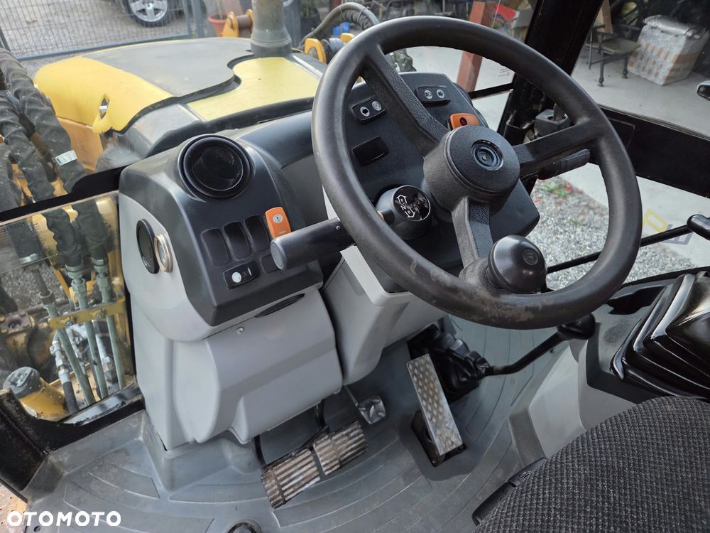 Caterpillar CAT 428E - 24