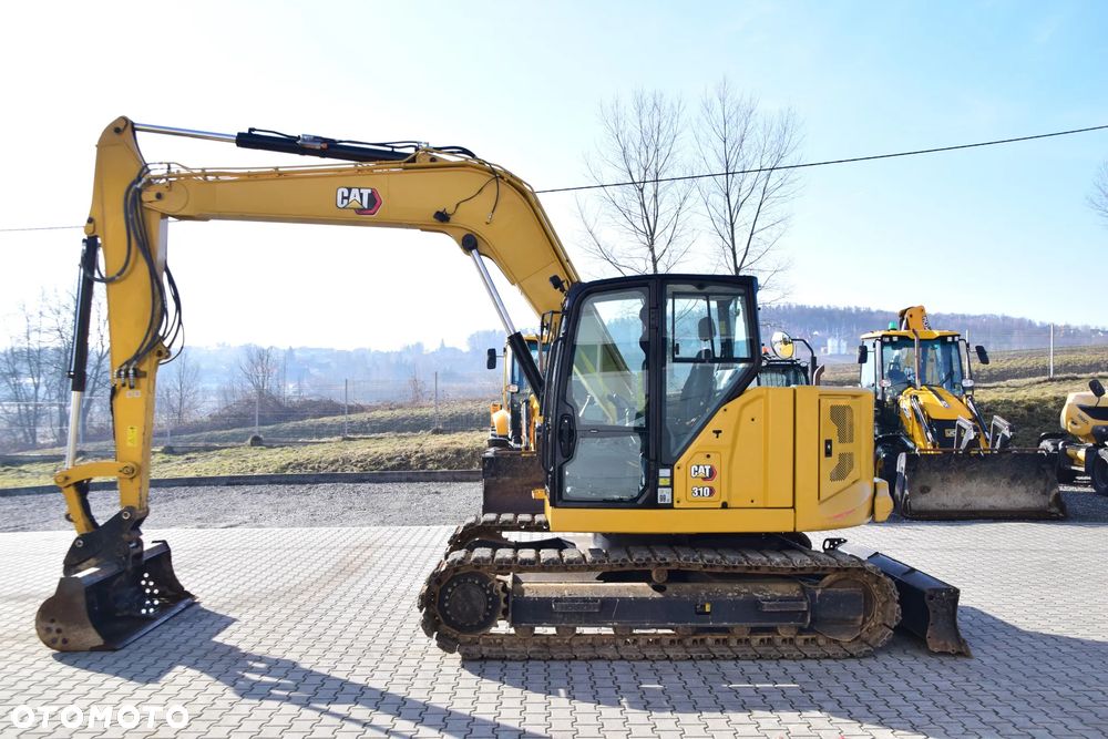 Caterpillar 310 - 3