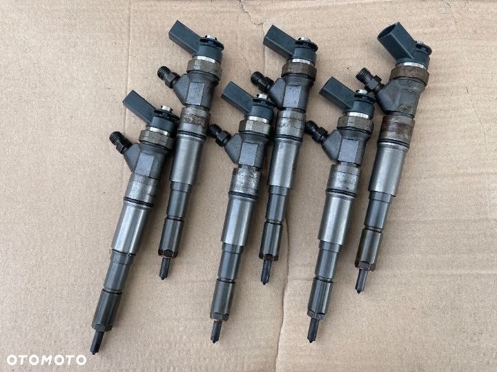 Wtryskiwacze komplet 6 sztuk Bmw e60 0445110131 - 1