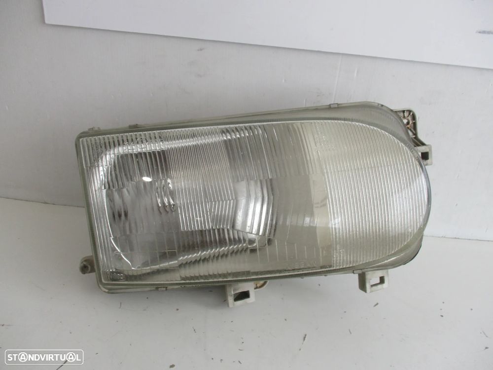 Farol optica Nissan Vanette 1999 - 3