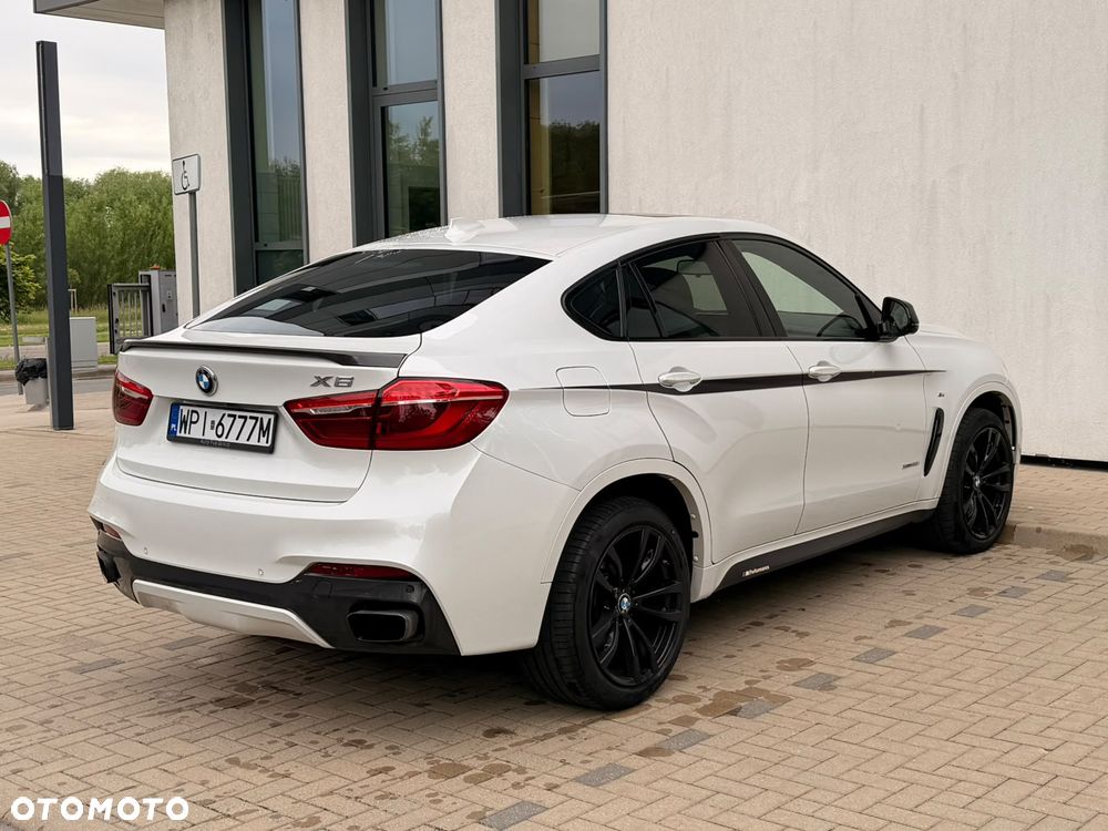 BMW X6 xDrive50i M Sport - 4