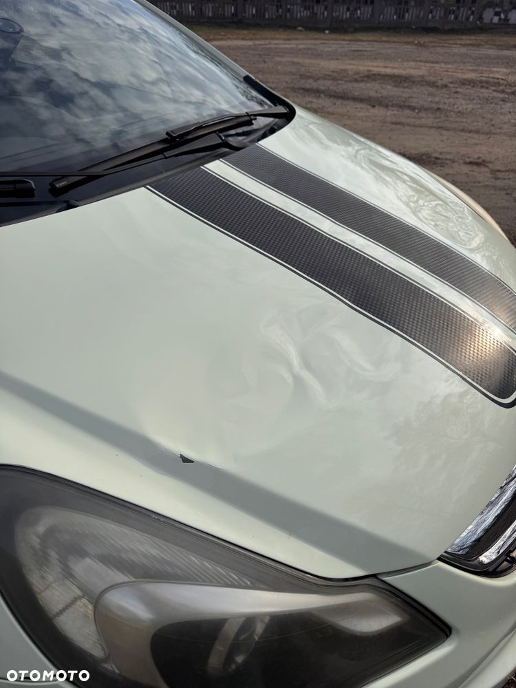 Opel Corsa 1.4 16V Cosmo - 13