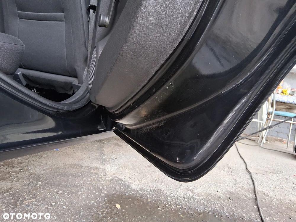 Opel Corsa 1.2 16V Enjoy - 19