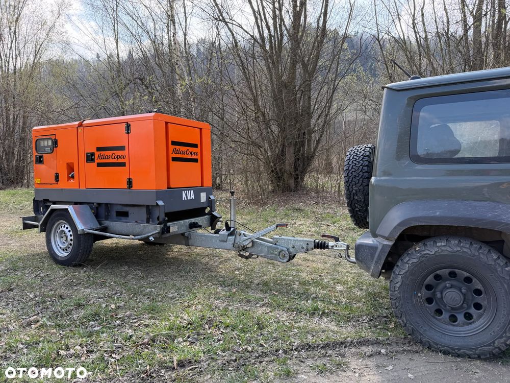 Atlas Copco QAS 40 KW Agregat prądotwórczy Przyczepa do rejestracji. inwerterowy wyciszony! 2014r. JAK NOWY z Norwegii. 5000mtg.Mocny silnik Turbo Kubota 4 cylindry 100km! Dekra aktualna. Opony zero zużycia. Zadbany Agregat. Odpala na Dotyk. Bogata Wersja! Prądnica Najlepsza PARTNER LEROY SOMER. - 37