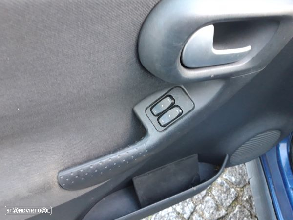 Interruptor Vidros Porta Cond/Pass Opel Corsa C (X01)