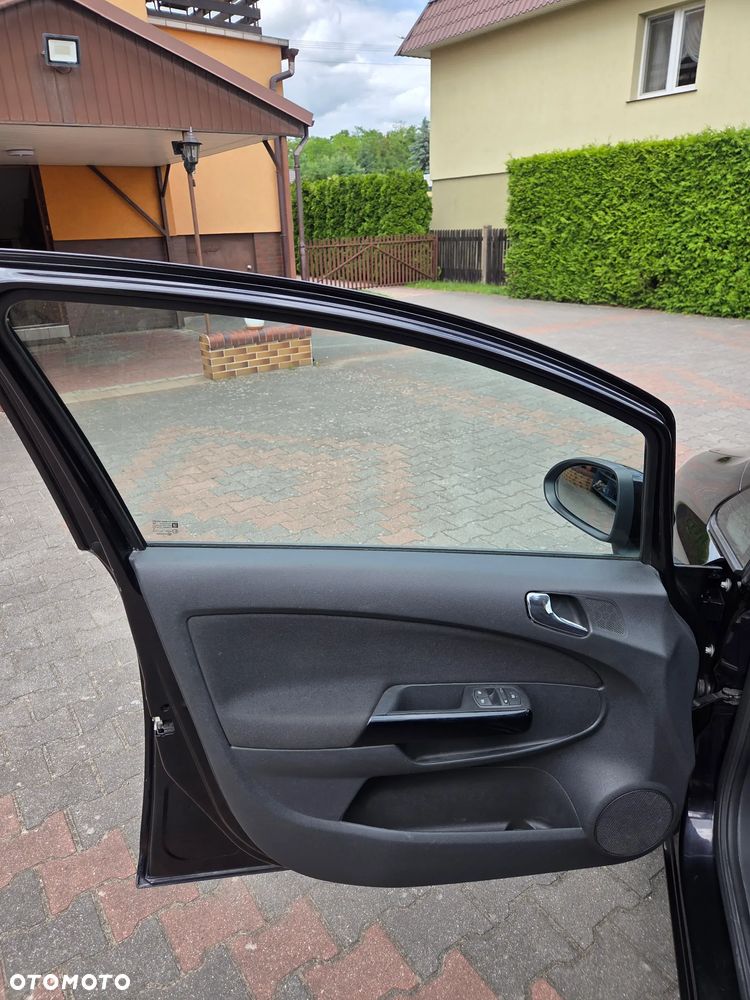 Opel Corsa 1.4 16V Satellite - 21