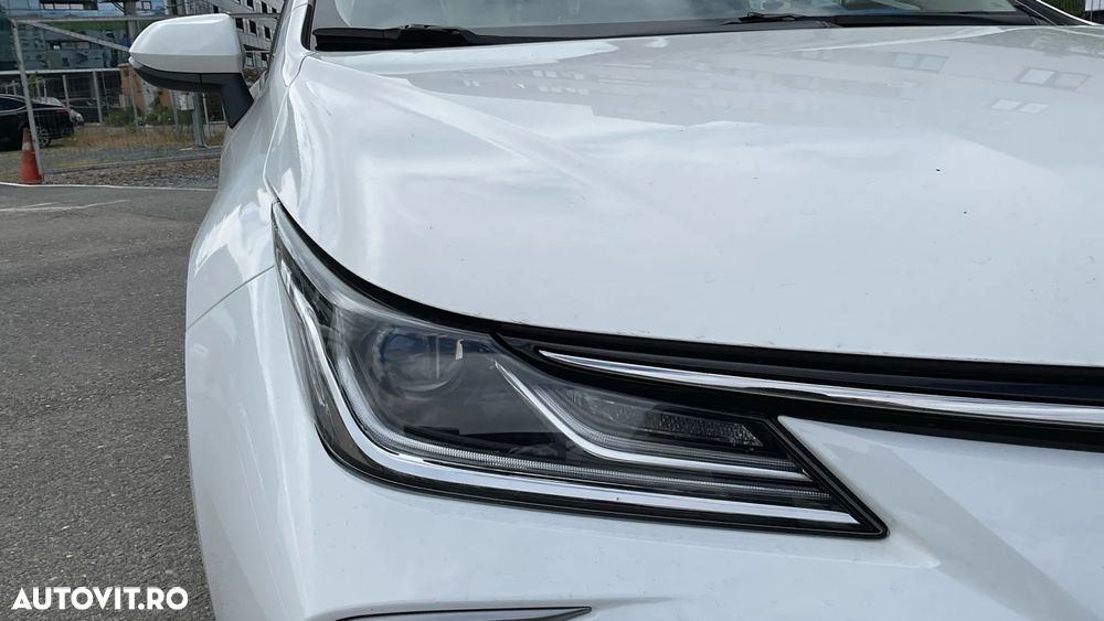 Toyota Corolla 1.8 HSD Business - 12