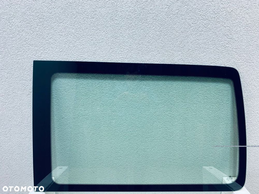 Szyba boczna lewa ostatnia VW TRANSPORTER T5 T6 OE