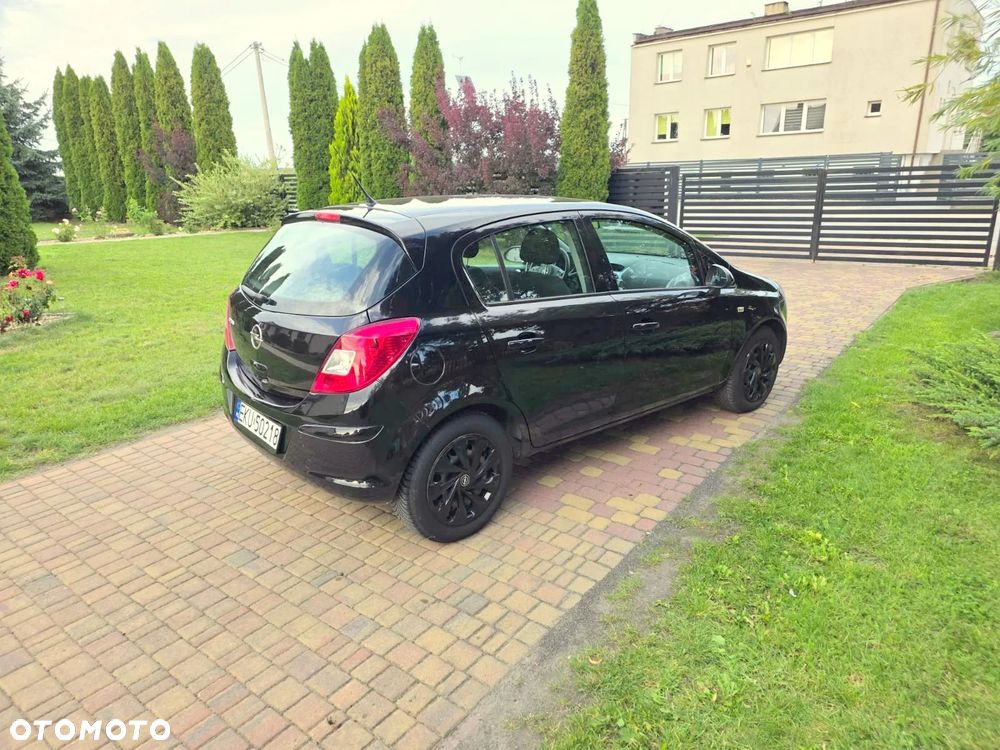 Opel Corsa 1.4 16V Enjoy - 9