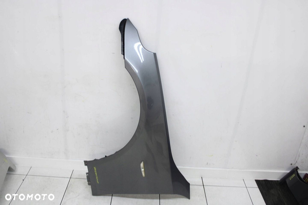 BŁOTNIK LEWY PRZÓD PRZEDNI BMW E60 E61 2003R- A52