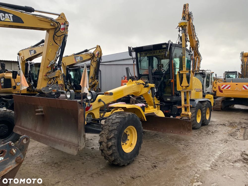 New Holland F106.7A, 7800 MTH, SYSTEM NIWELACJI TRIMBLE 3D, Z NIEMIEC, NAPĘD 6X6, ZRYWAK, PRZEDNI PŁUG, - 7
