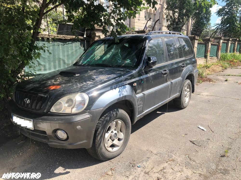 Far stanga/Far dreapta fata Hyundai Terracan 2006