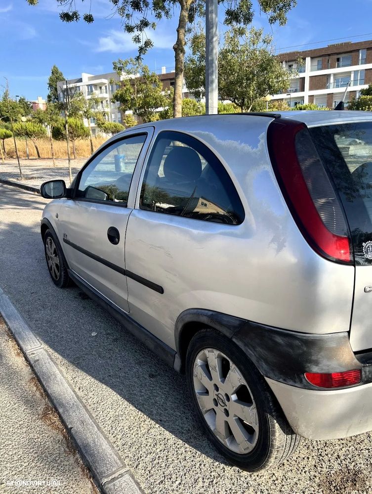 Opel Corsa 1.2 16V Enjoy - 6