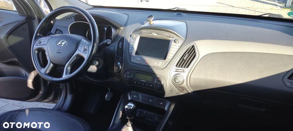 Hyundai ix35 blue 1.6 2WD Finale Gold - 12