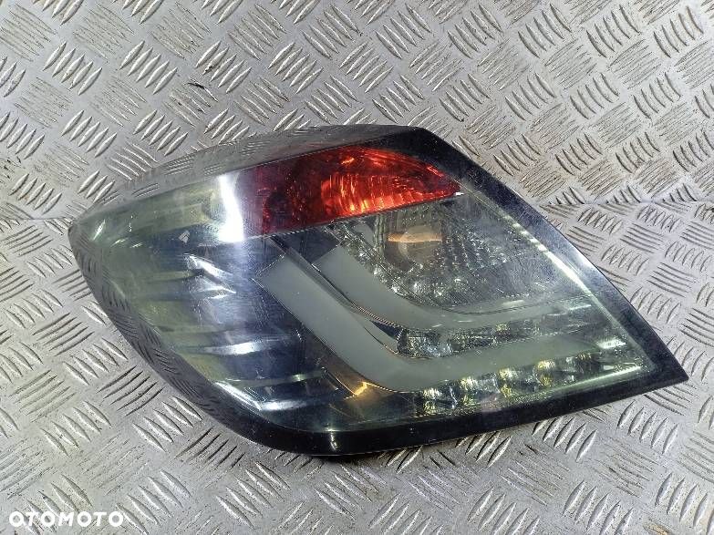LAMPA LEWA TYLNA OPEL ASTRA H - 1