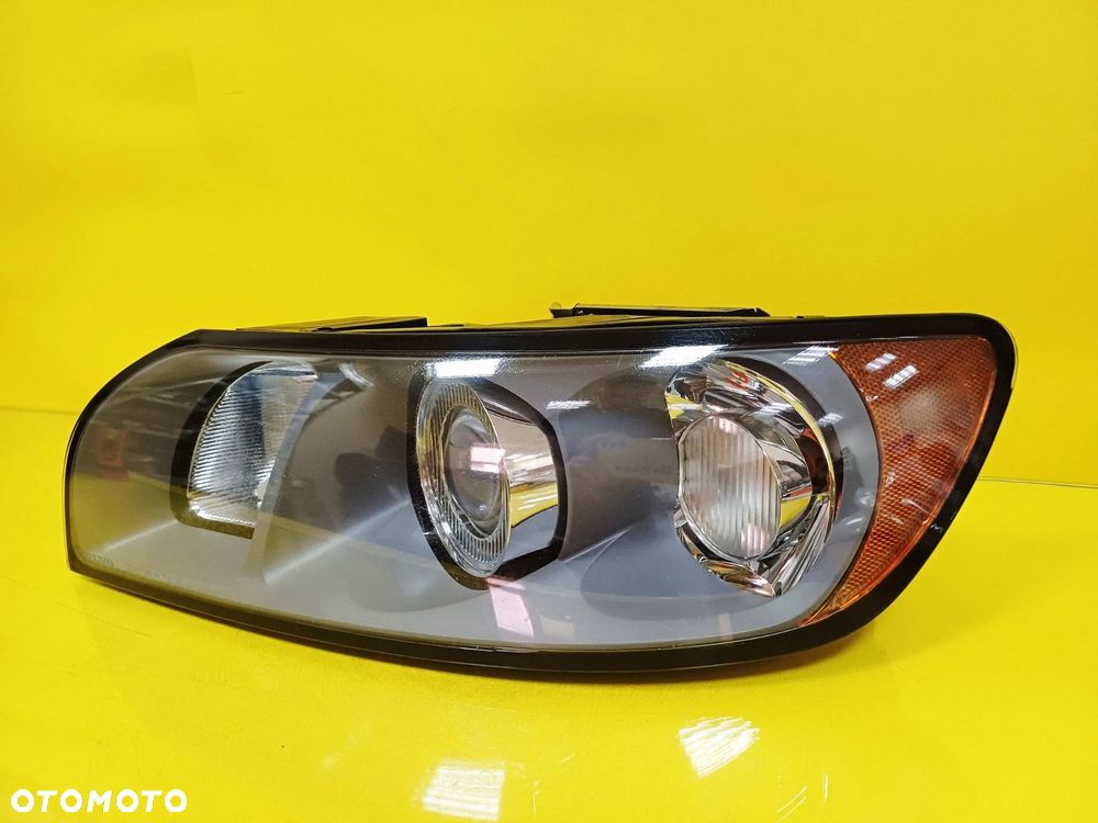REFLEKTOR LAMPA LEWY PRZÓD SOCZEWKA VOLVO V50 I 31335221 NR103 - 2