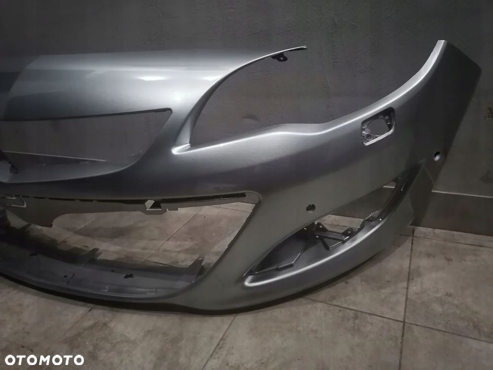 zderzak przód przedni opel astra j 2012r- lift xenon x4 pdc Y40R Z22C GAR Z190 GWH Z187 GWA Z40R GAZ GCW Z186 Z41C GOP Z22A GEU Z20Z GEK Z21Y GEP Z177 GAL Z176 GAN GBM Z12U Z22S GWJ Z20R GBG Z50H GCS Z40Y 55U Z179 GEV Z30K GAY Z50B 63U GBH Z40Q AJU GWD Z161V Z162 GWE Z41E G6R Z30V Z30Q GOK 2GU Z50C Z22N GU3 Z22M GOL Z20Z z474 Z41V - 2