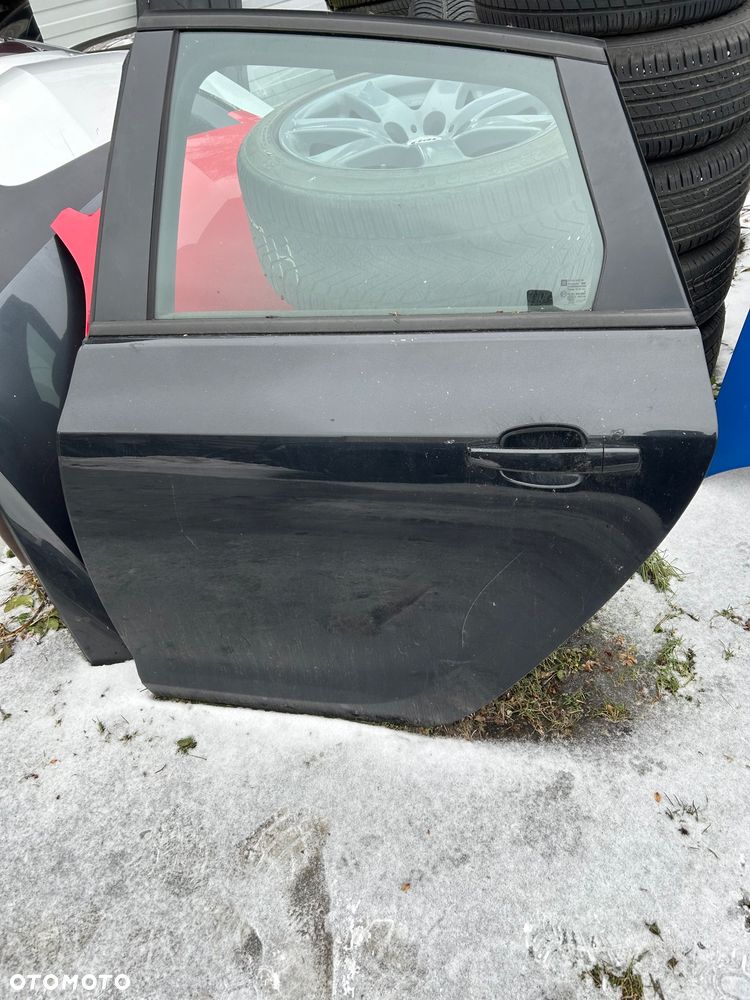 Drzwi lewe tylne Opel Astra J HB Z22C - 1