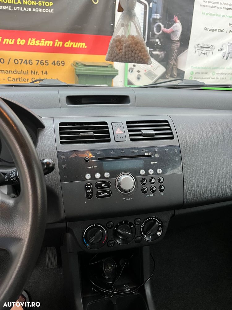 Suzuki Swift 1.3 GLX - 12