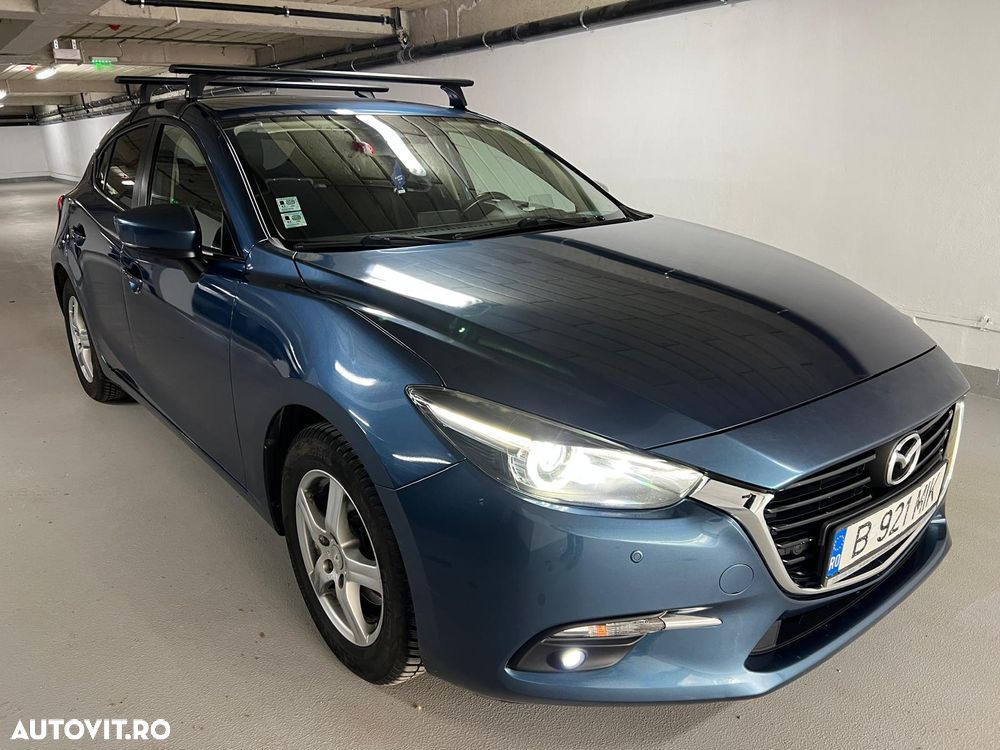 Mazda 3 G165 Revolution - 1
