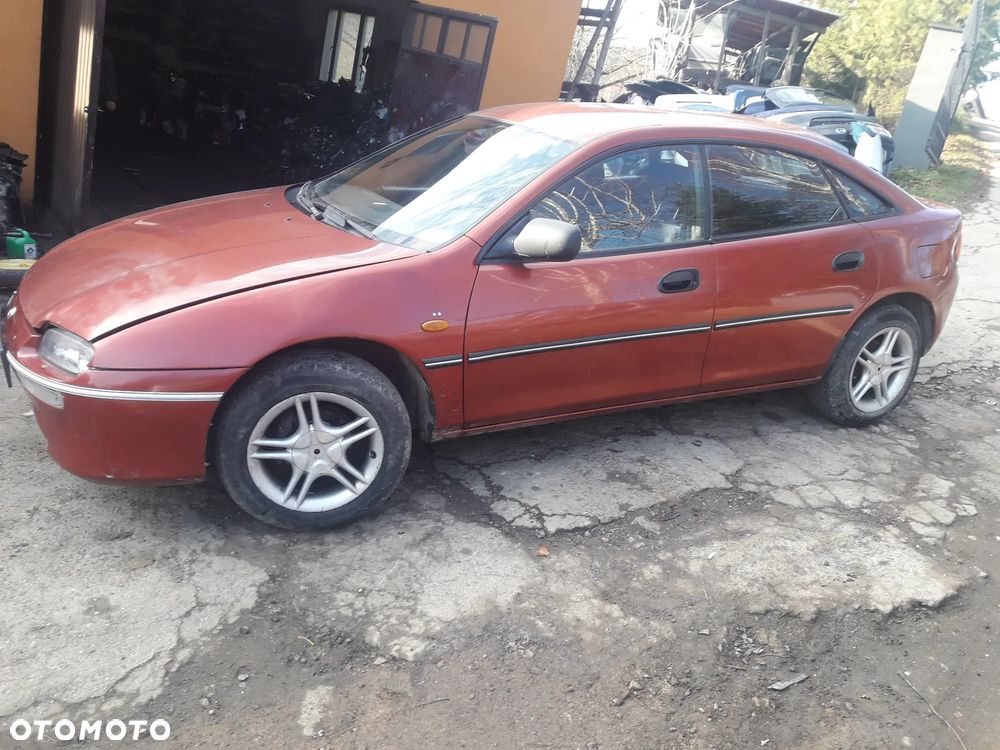 Mazda 323f 323 323p BA 94-98  Zwrotnica piasta Prawa lewa przednia prz - 5