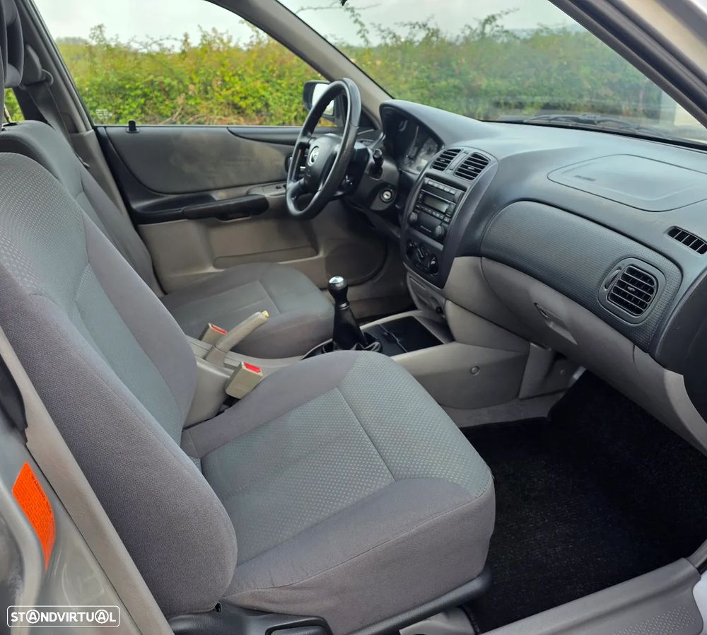 Mazda 323 F 1.3 Comfort AC F/L - 14