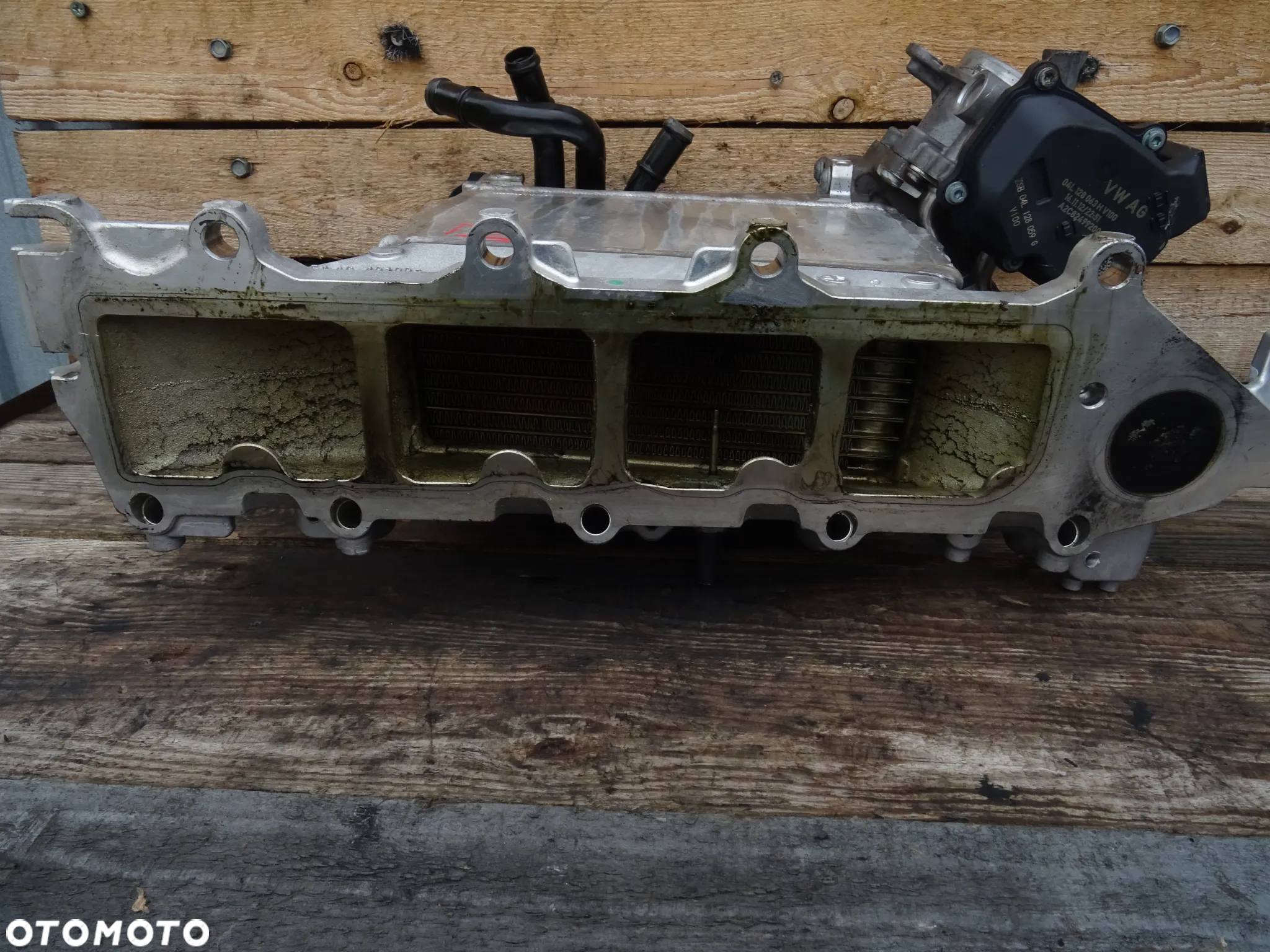 KOLEKTOR SSĄCY AUDI A6 A4 Q5 2,0TDI 04L129766B - 2