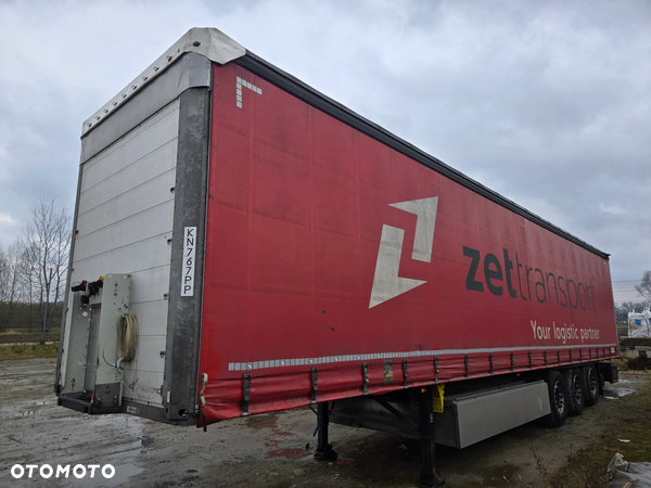 Schmitz Cargobull Firanka z koszem na palety