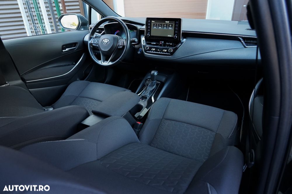 Toyota Corolla 1.8 HSD Business - 11